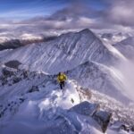 Climbing a snowy mountain