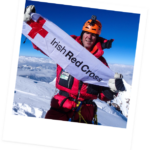 Jason Black with a irish red cross banner