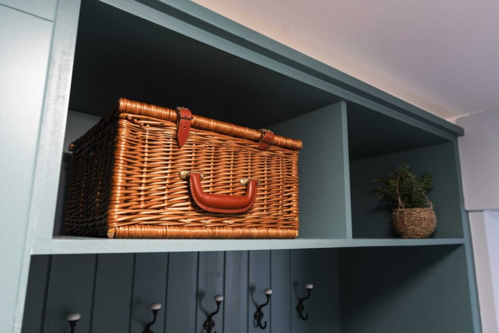 woven hamper on a shelf