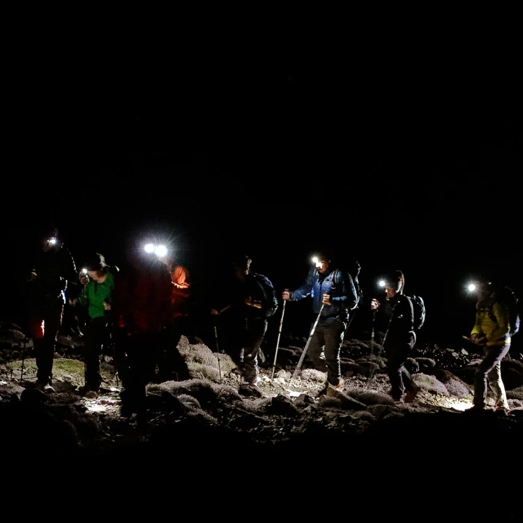 Female expedition team at the Toubkal Refuge at 3,600m Morocco the night before summit day