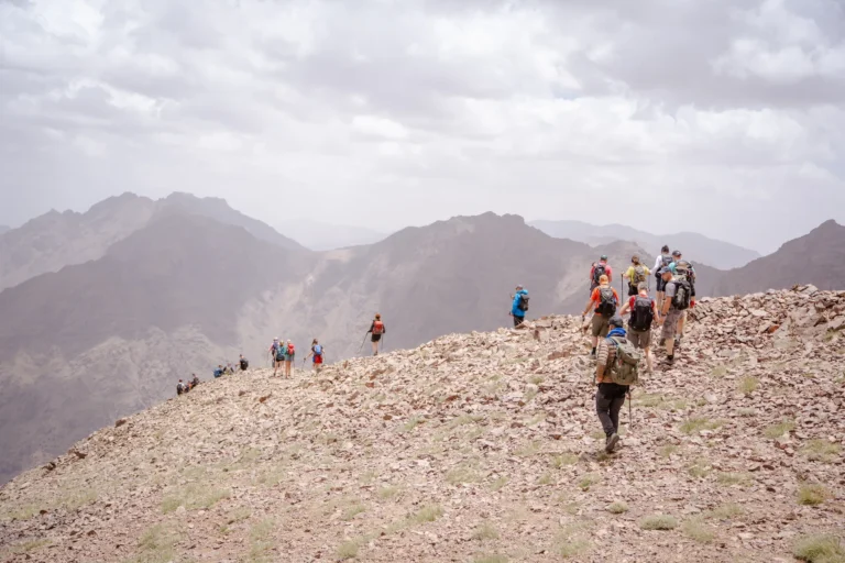 Trekking team departing Imlil village for the Morocco 7 Summits Challenge
