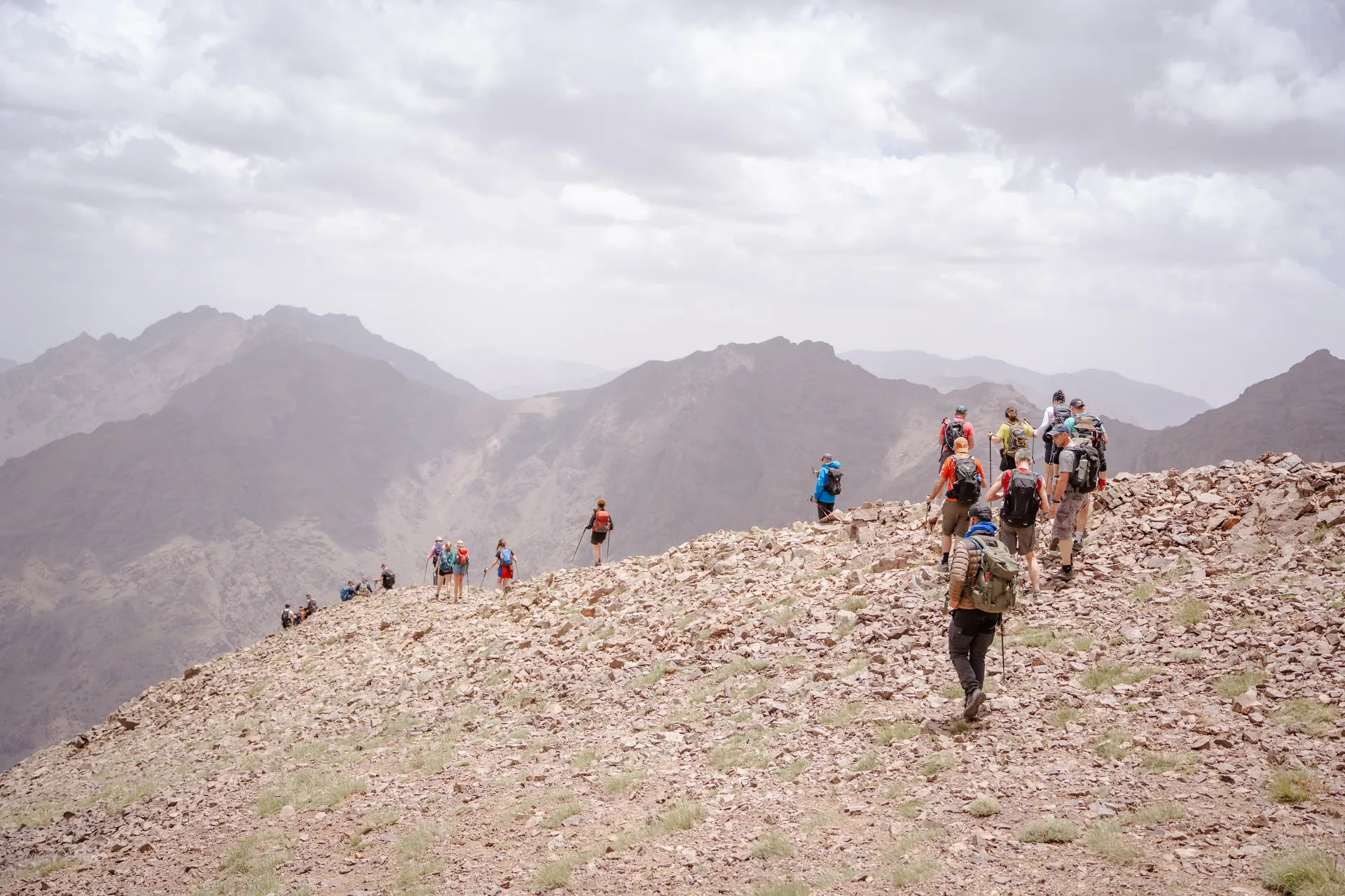 Trekking team departing Imlil village for the Morocco 7 Summits Challenge