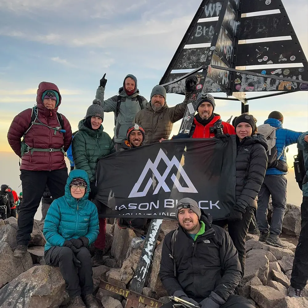 Exhausted team reaching Mweelrea summit in County Mayo after 30 hours on Ireland 4 Peaks Challenge