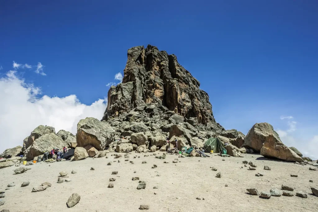 Climbers at Lava Tower 4600 metres on Kilimanjaro Machame Route acclimatisation day climb high sleep low Meta 