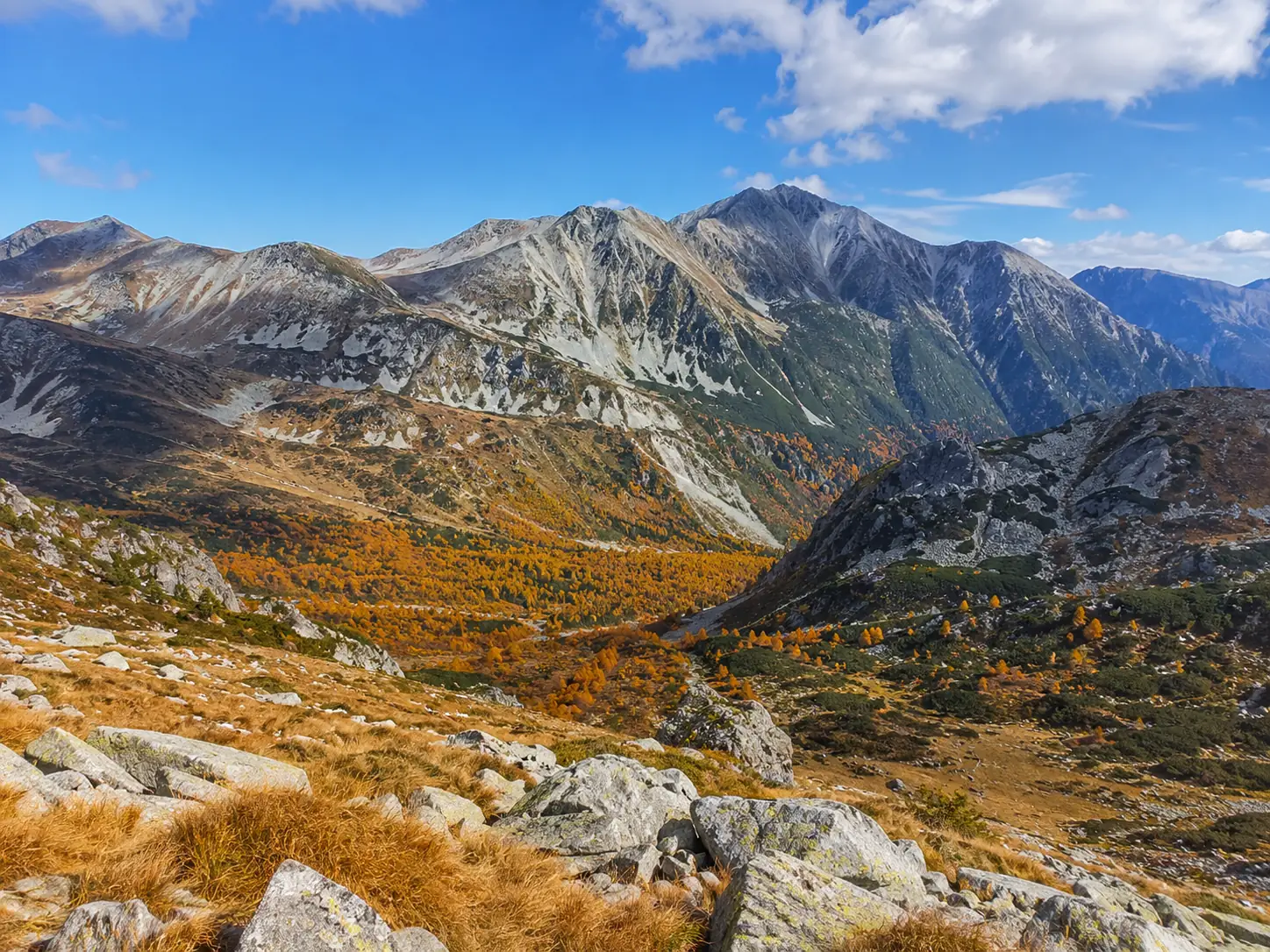 Panoramic view of white marble peaks and rocky ridgeline in Pirin National Park Bulgaria in autumn