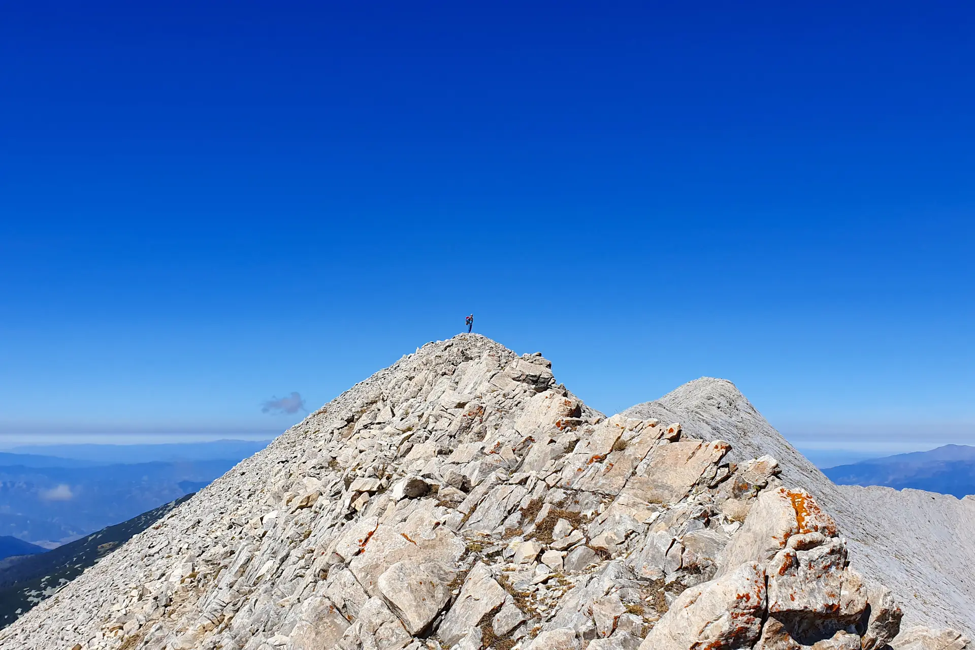 Rocky summit of Vihren peak at 2914 metres in Bulgaria's Pirin National Park before Koncheto traverse