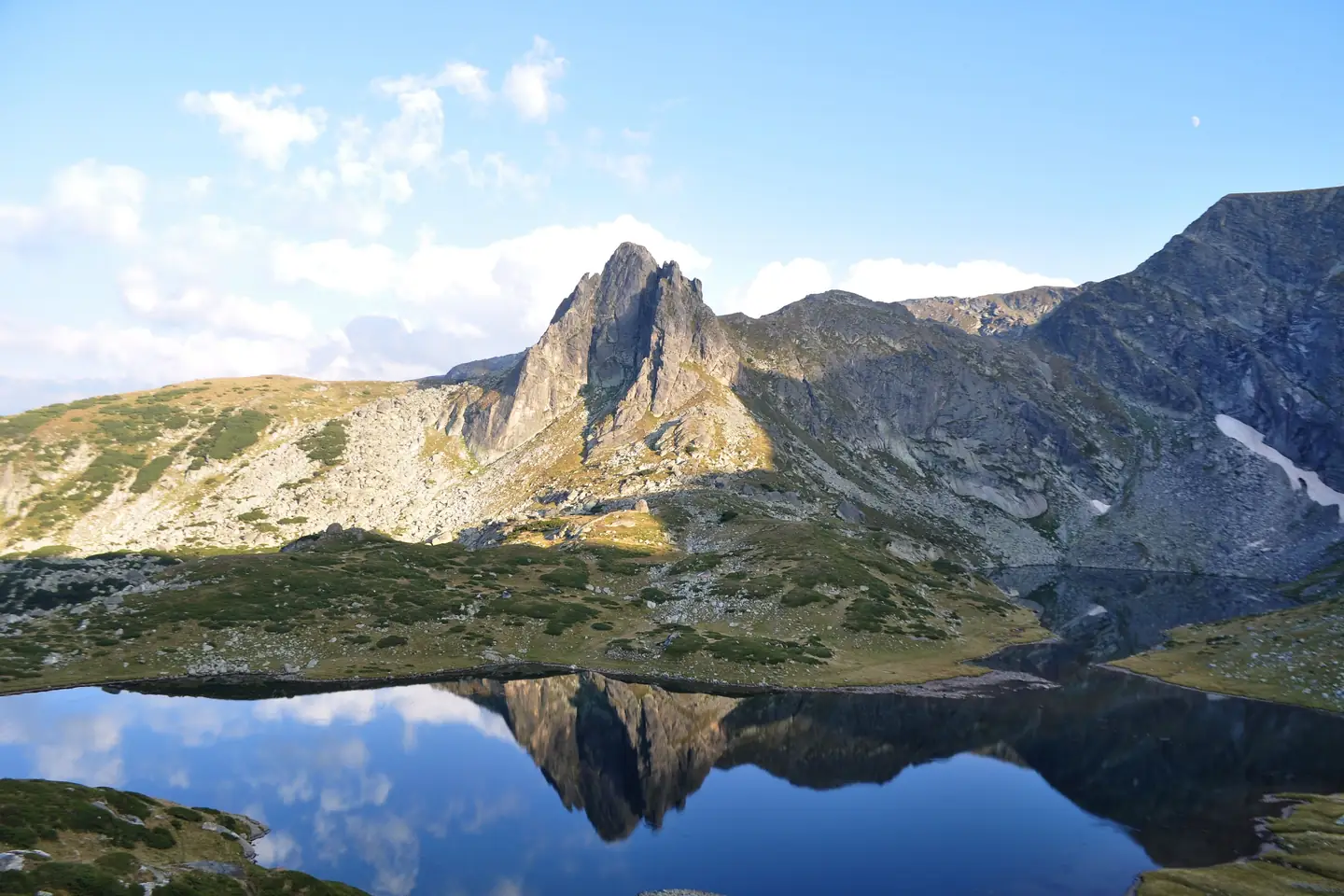 Expedition team hiking past Rila glacial lakes on Bulgaria 7 Summits traverse Day 5 route
