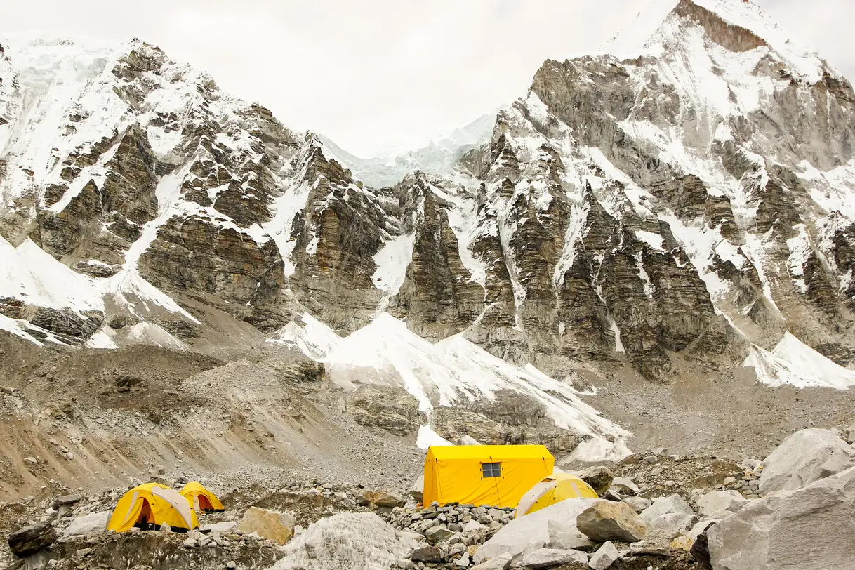 Expedition team at Himlung Himal Base Camp 4900m during acclimatization rotation phase Nepal Nar-Phu Valley